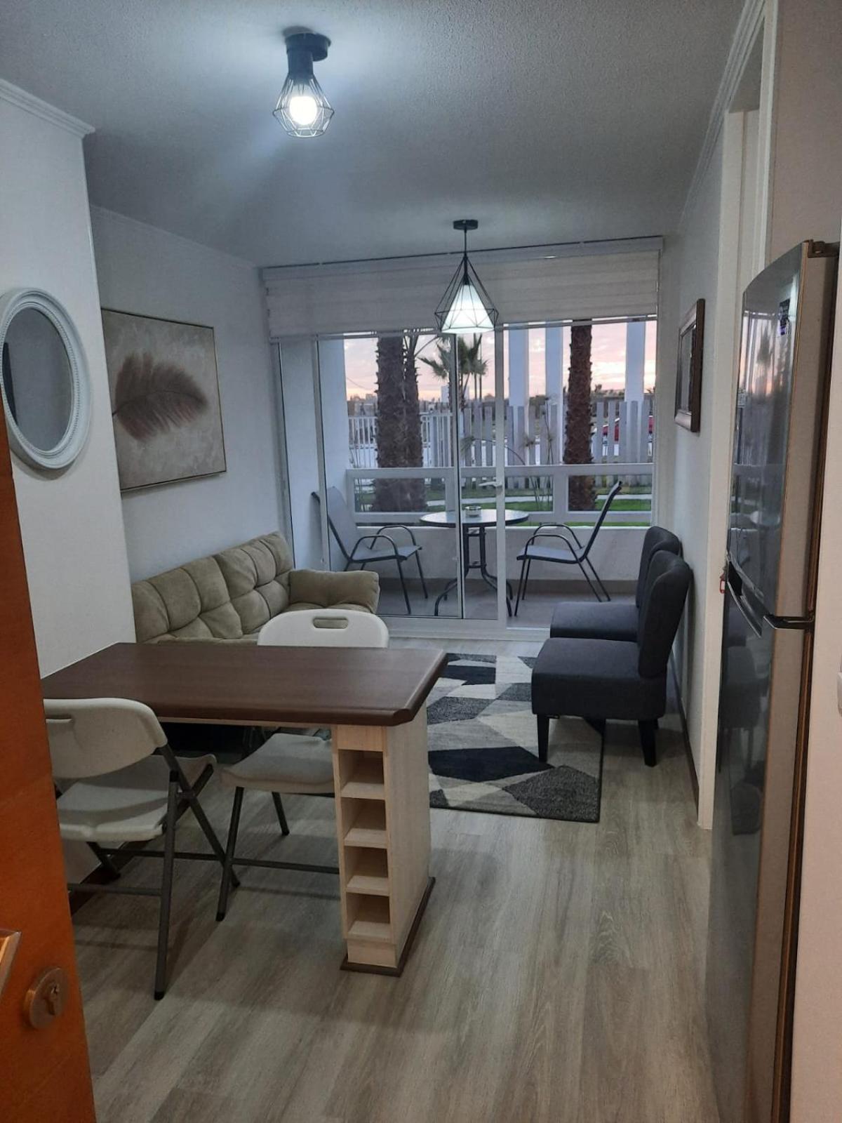 Acogedor Departamento Central con Piscina, Estacionamiento Privado y Más