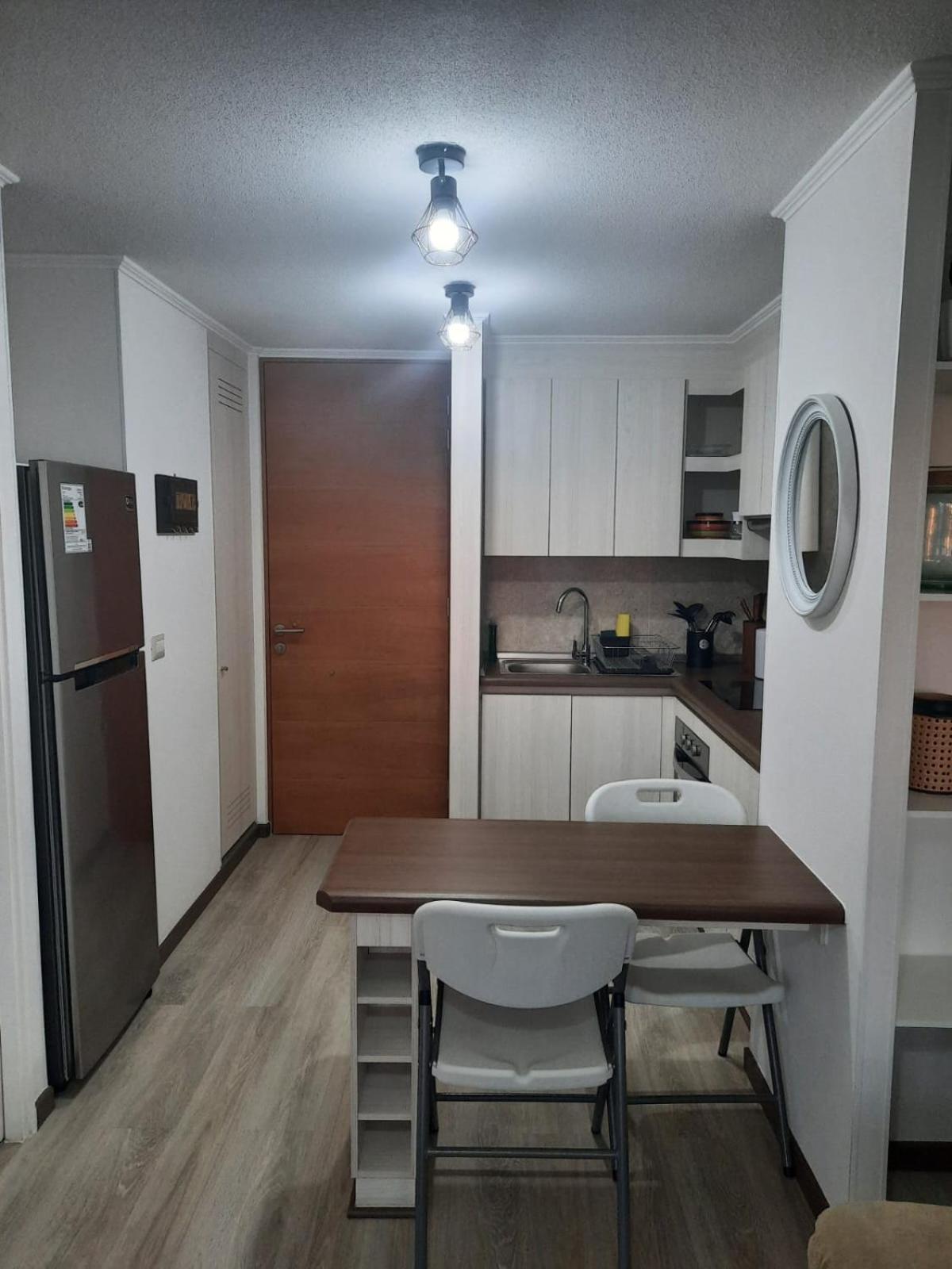 Acogedor Departamento Central con Piscina, Estacionamiento Privado y Más