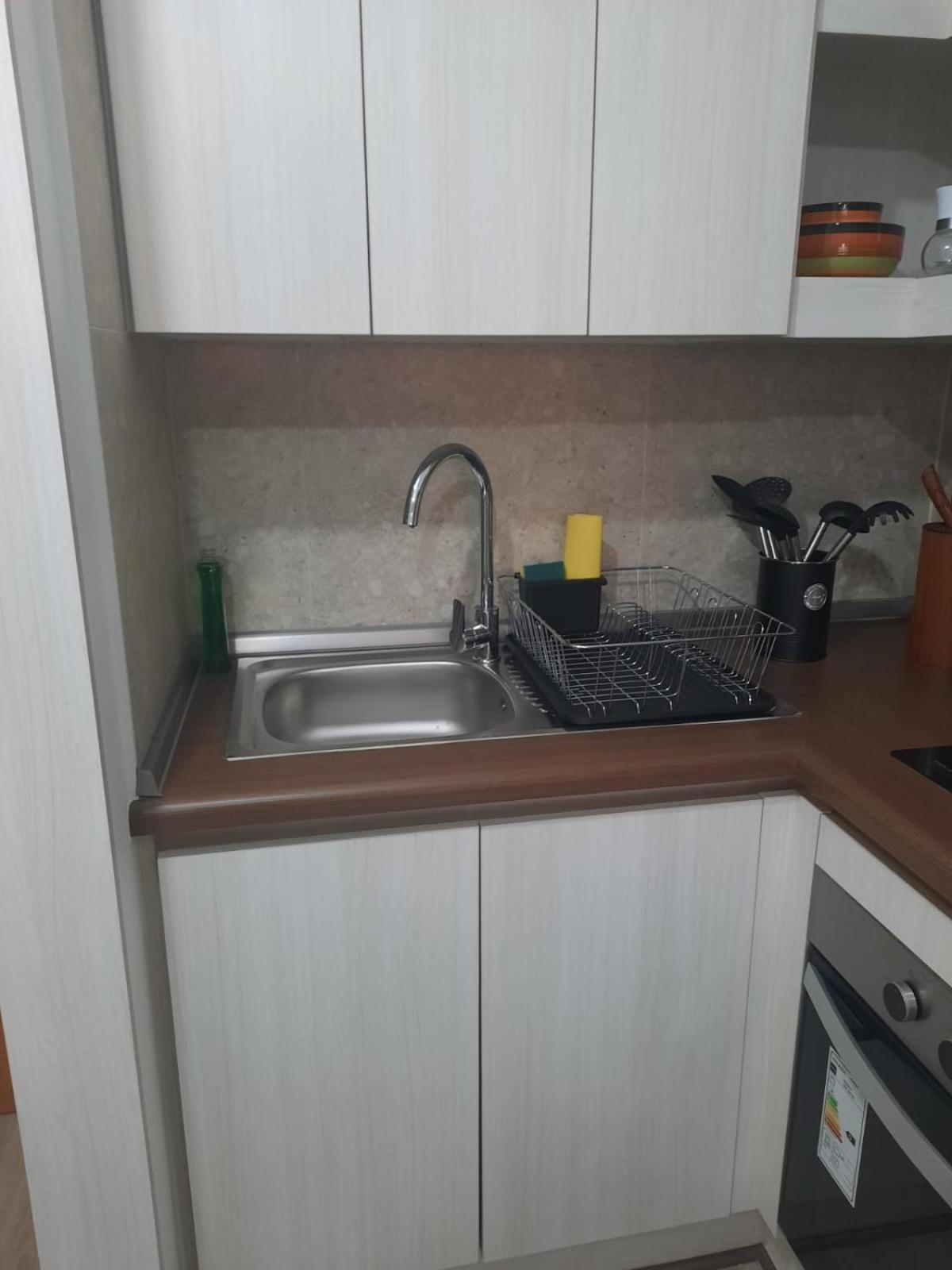 Acogedor Departamento Central con Piscina, Estacionamiento Privado y Más