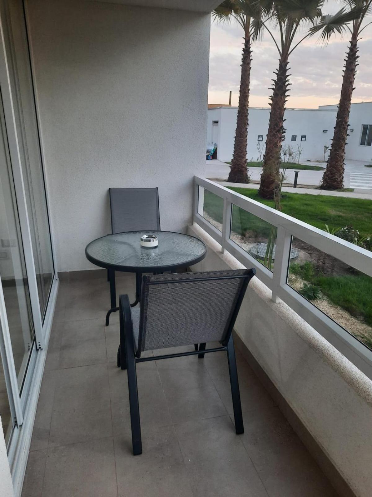 Acogedor Departamento Central con Piscina, Estacionamiento Privado y Más
