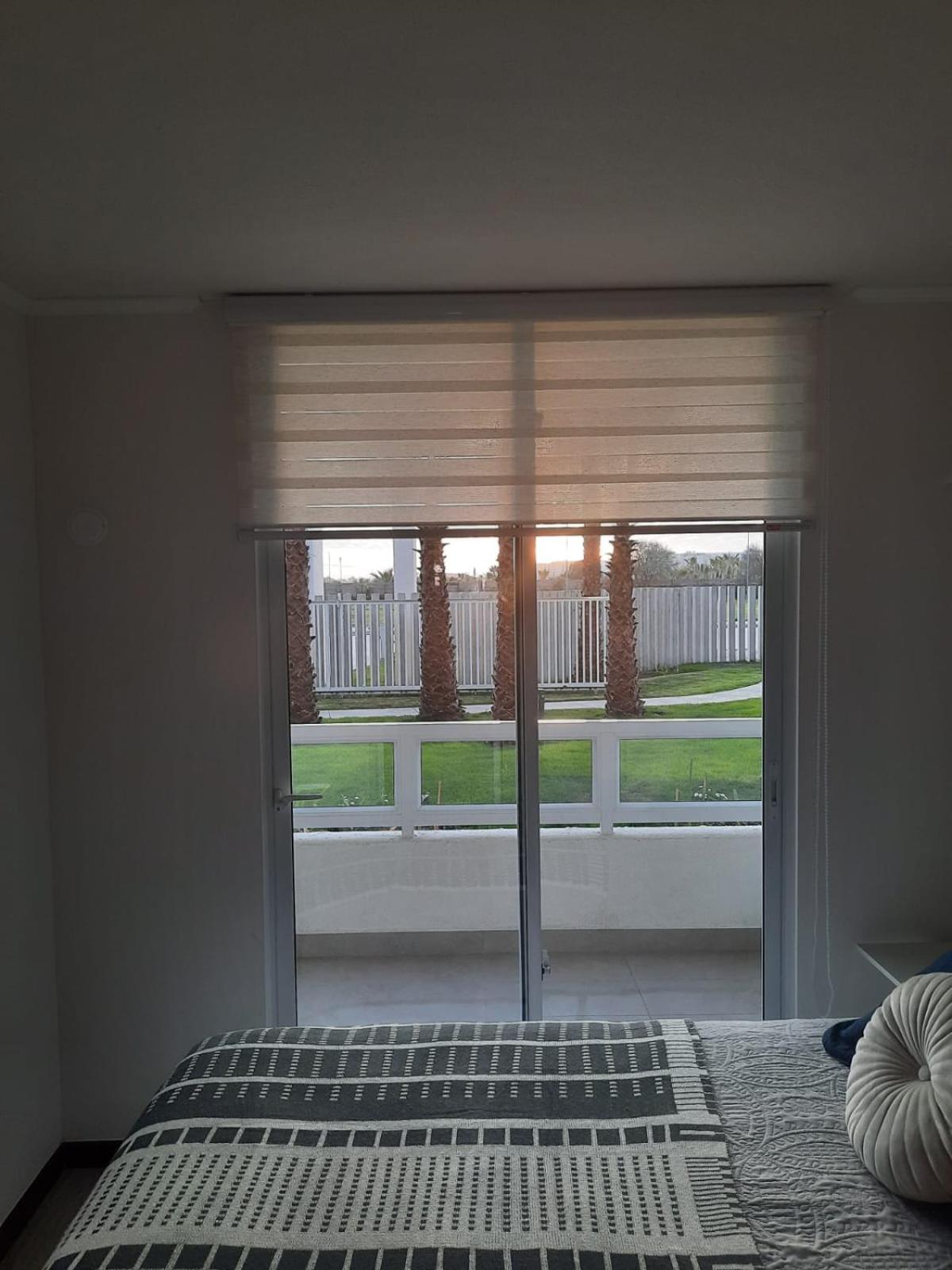 Acogedor Departamento Central con Piscina, Estacionamiento Privado y Más