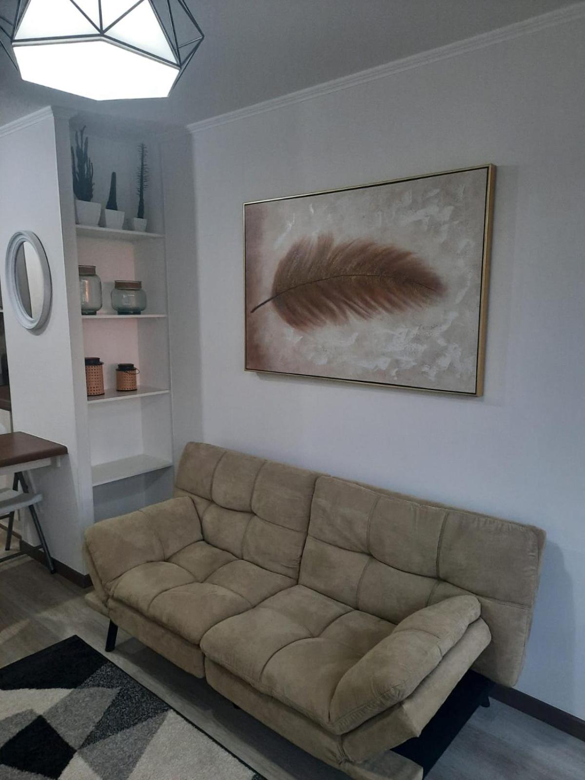 Acogedor Departamento Central con Piscina, Estacionamiento Privado y Más