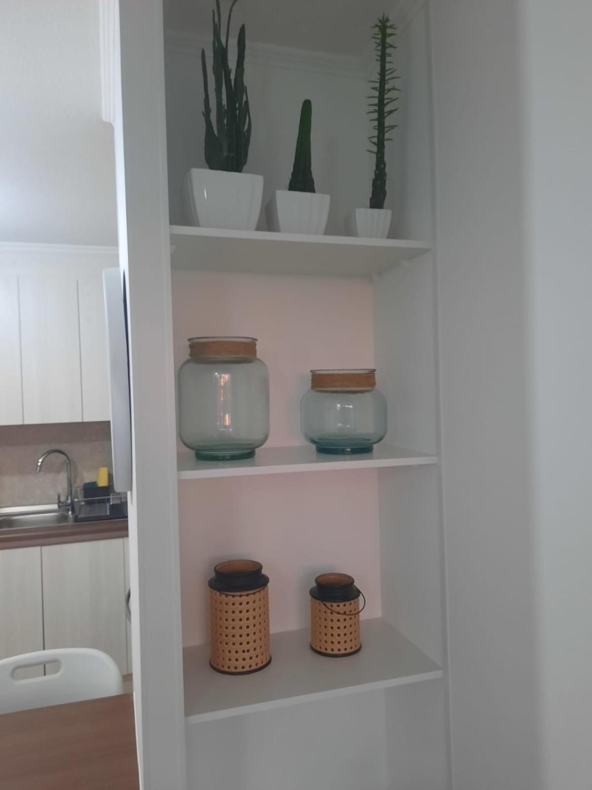 Acogedor Departamento Central con Piscina, Estacionamiento Privado y Más