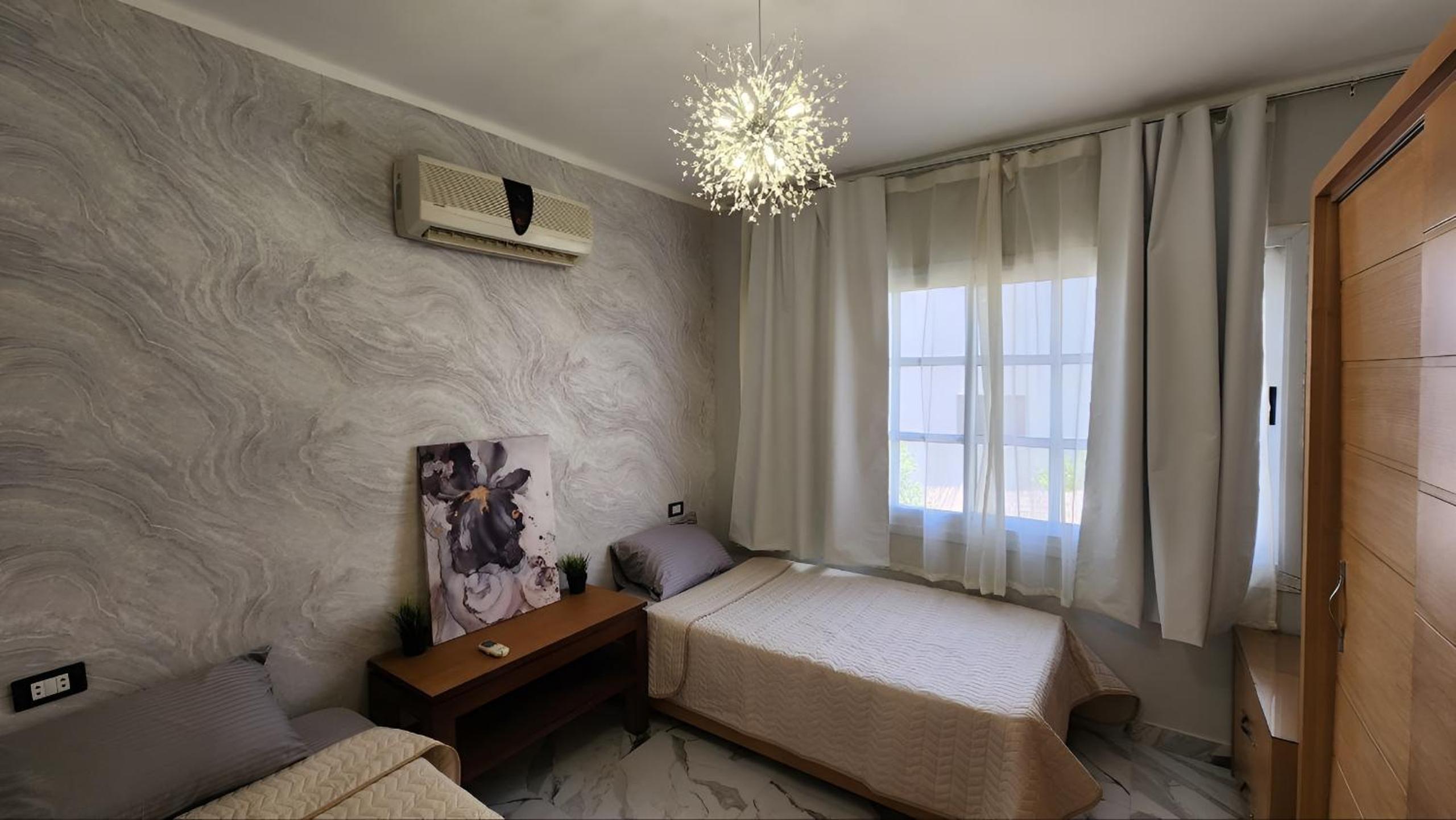 Luxury 2-Bedroom Poolside Apartment