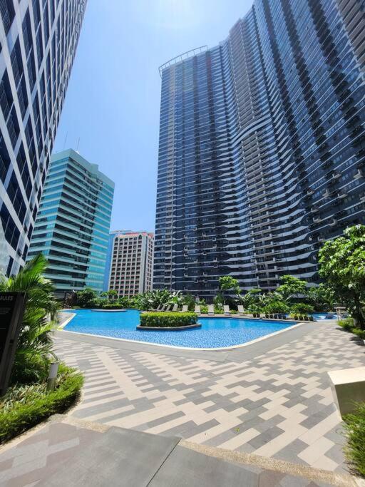 Makati CBD One Bedroom with Balcony and Pool View near Ayala and Buendia view 5