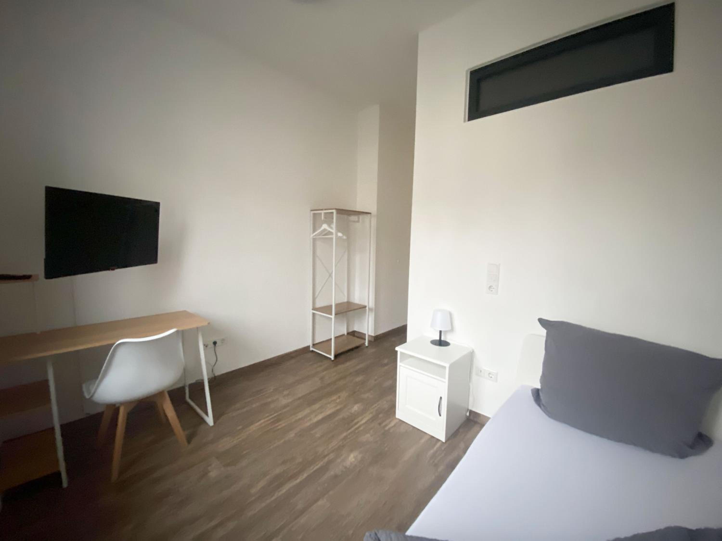 BIELEFELD CITY APARTMENTS - komfortable Einzelzimmer und Doppelzimmer - moderne Badezimmer, schnelles WLAN, Self-Check-In