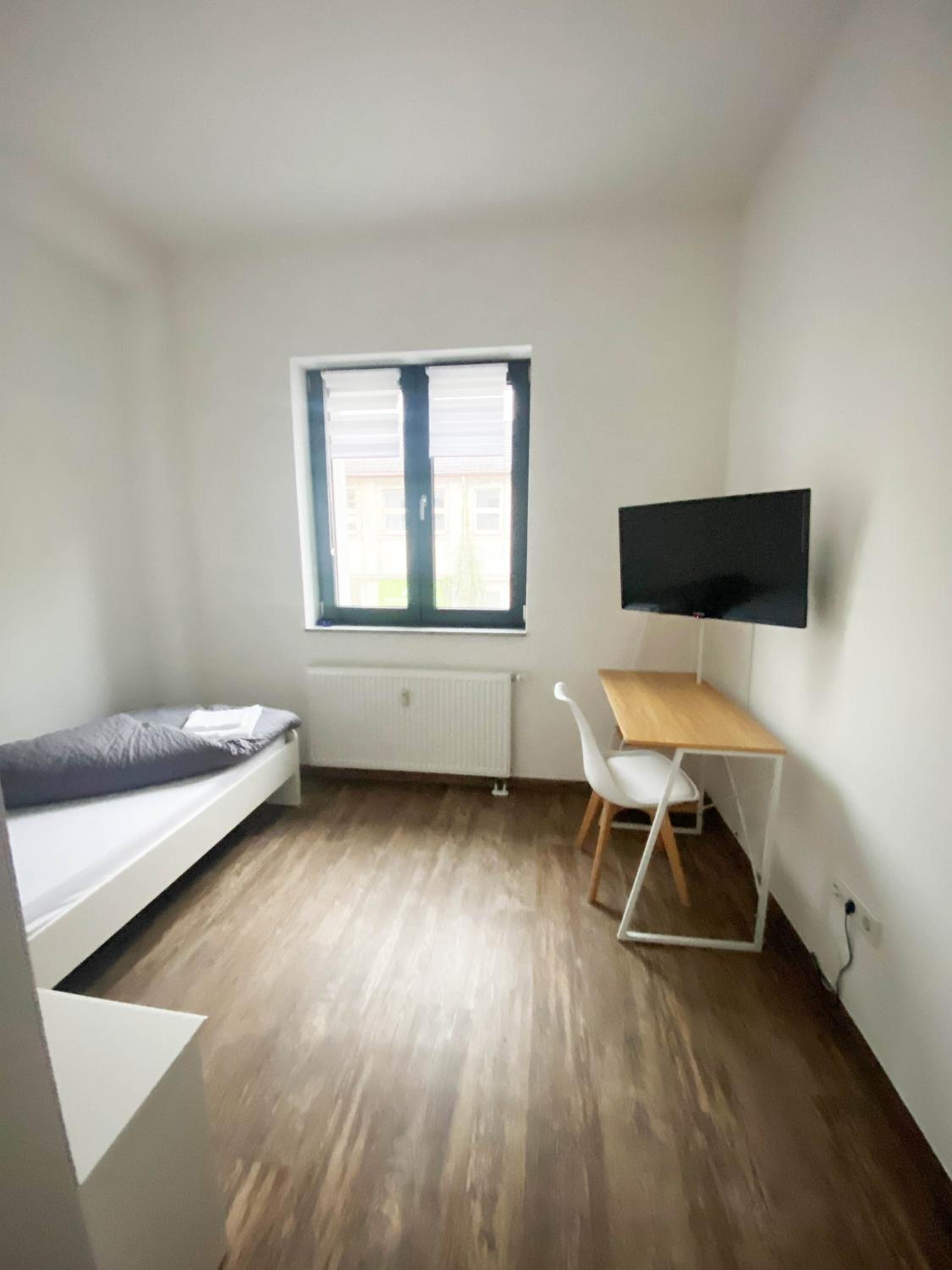 BIELEFELD CITY APARTMENTS - komfortable Einzelzimmer und Doppelzimmer - moderne Badezimmer, schnelles WLAN, Self-Check-In