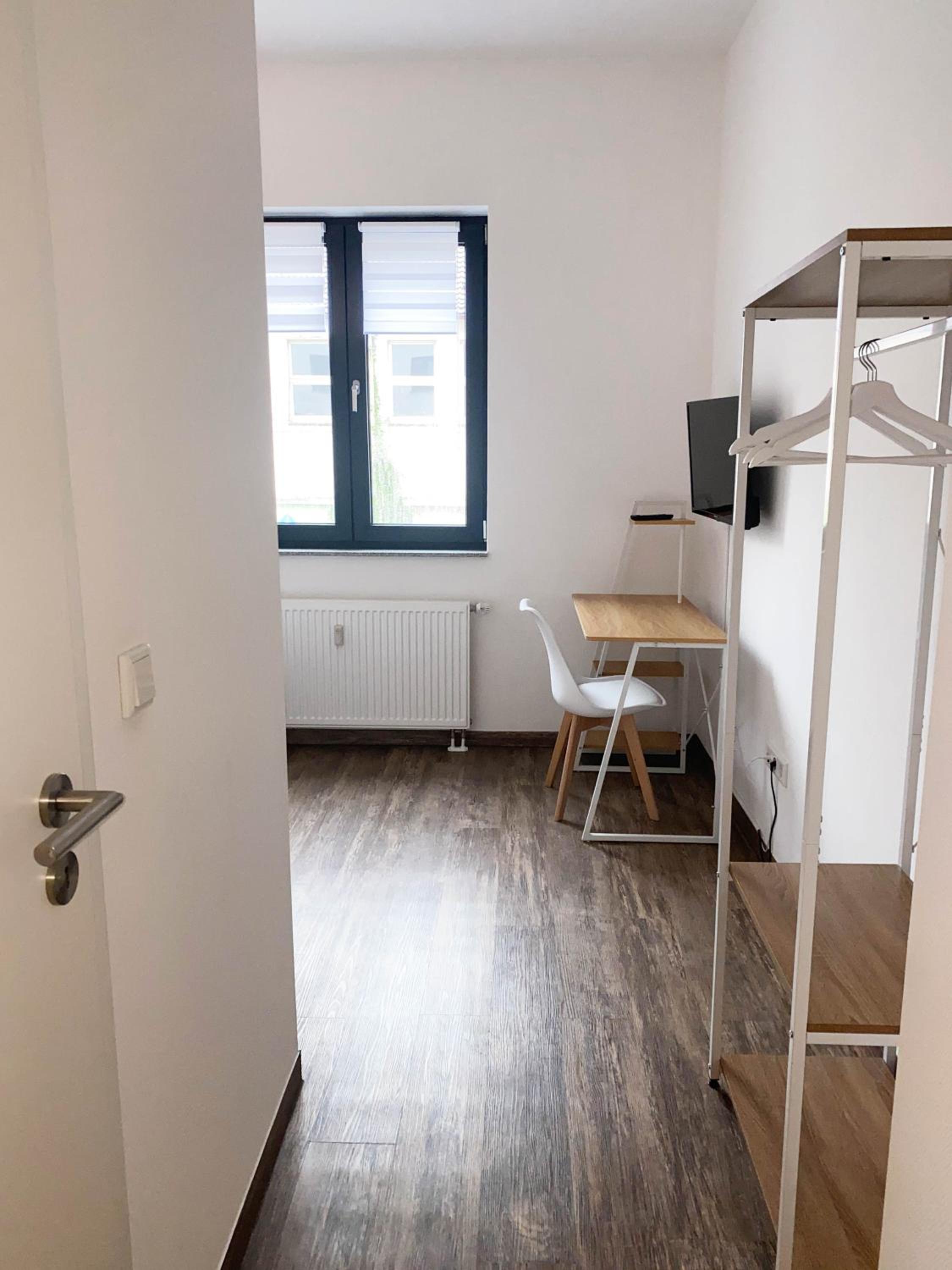 BIELEFELD CITY APARTMENTS - komfortable Einzelzimmer und Doppelzimmer - moderne Badezimmer, schnelles WLAN, Self-Check-In
