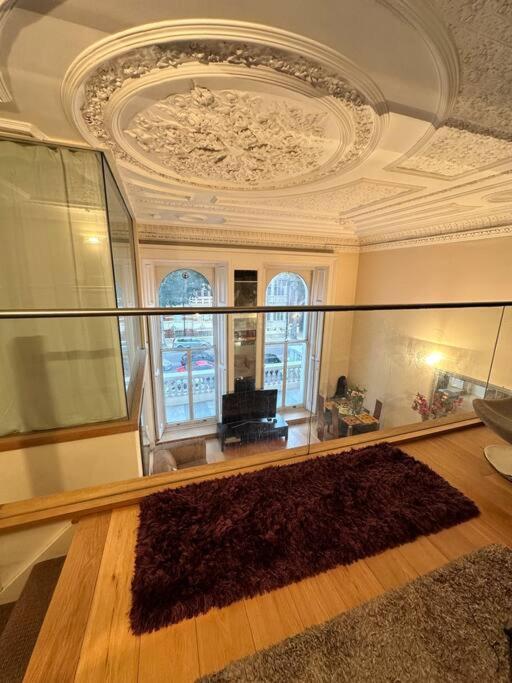 Grade II Listed Balconied 3-Bed Mezzanine Kensington Flat