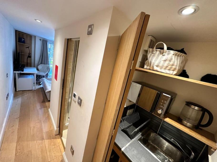 Grade II Listed Balconied 3-Bed Mezzanine Kensington Flat