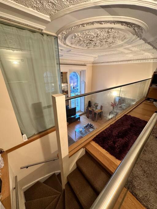 Grade II Listed Balconied 3-Bed Mezzanine Kensington Flat