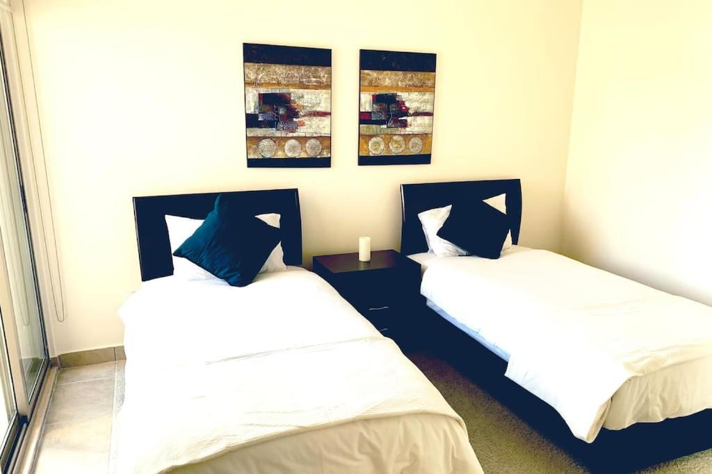 Sleek & Cozy Apartment with Pool & Patio In Abdoun view 2
