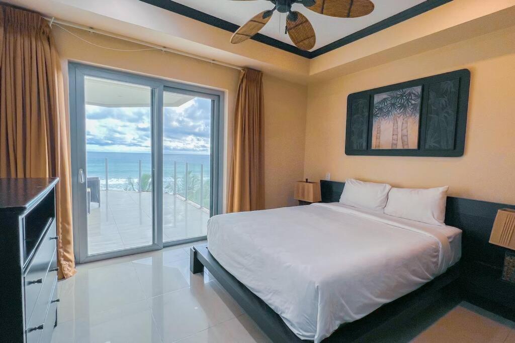 Luxury beach condo, stunning sunset & ocean view