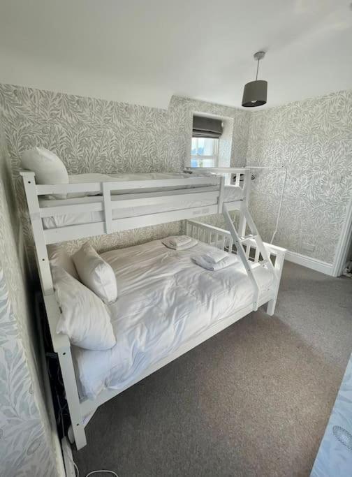 Perfectly Located, Central Bowness Flat With Free Parking and Lake Views view 2