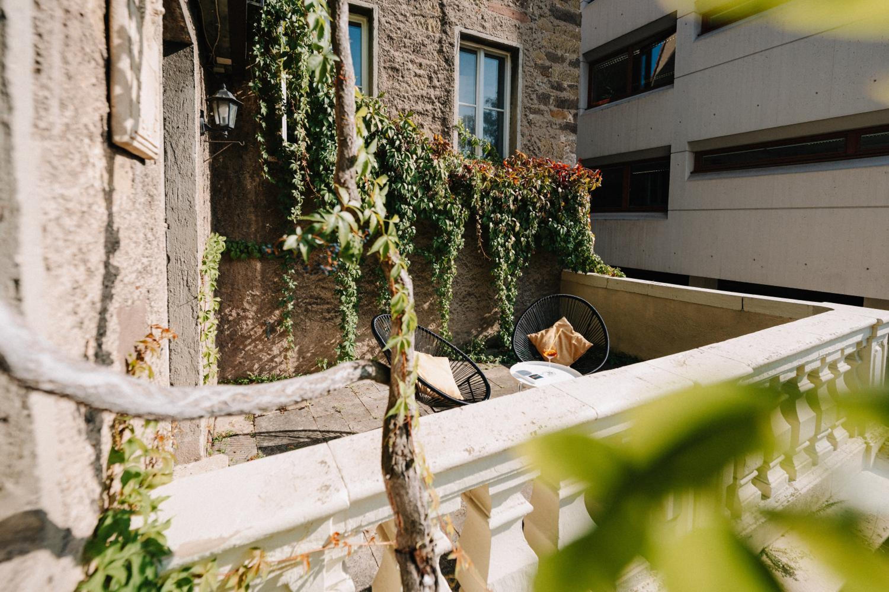 Appartement Residenz Bella Italia - Charmante Unterkunft im Herzen von Würzburg mit Balkon, Terrasse und Parkplatz im Innenhof!