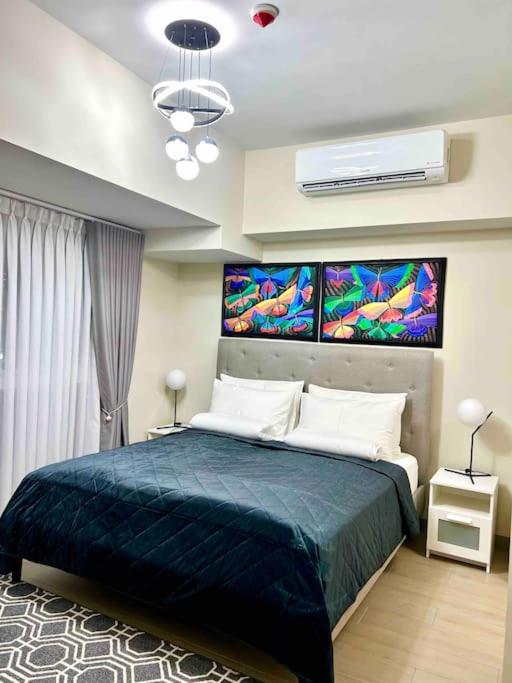 Cozy 2 Bedrooms in BGC with Balcony Bathtub 600Mbps