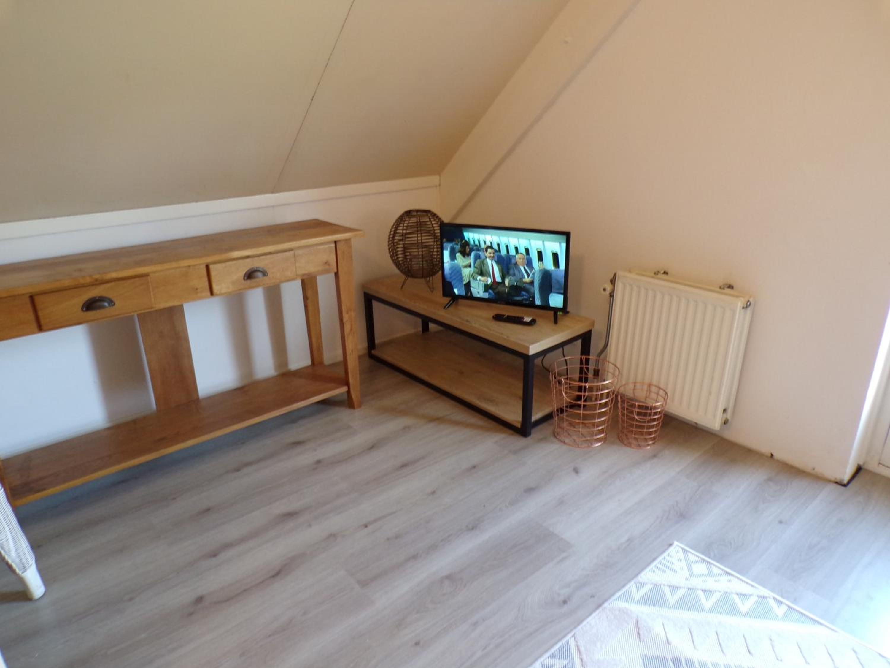 Gezellige vakantiewoning aan het water in Ewijk - recreational only no workers