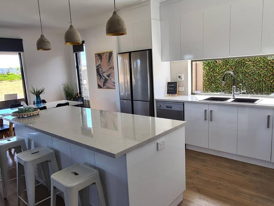 Coastal Palms - relax by the golf course