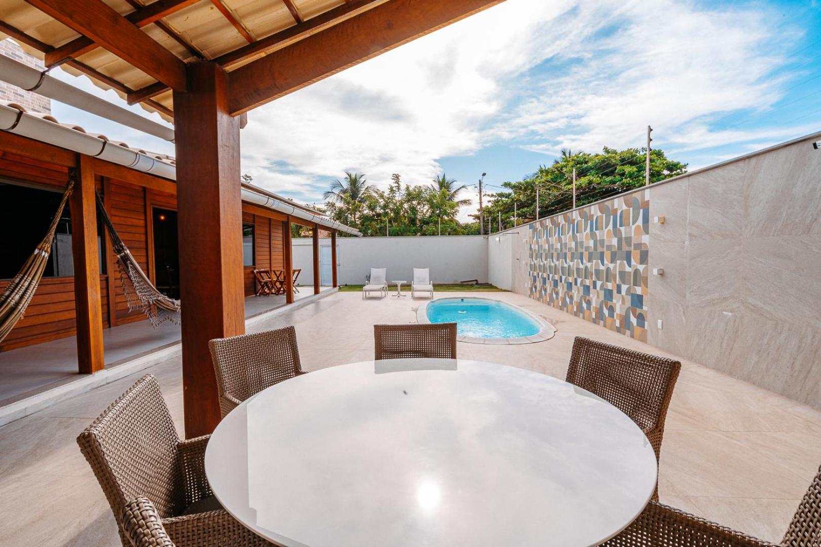 casadecastelhanos, Quadra do MAR de CASTELHANOS, 4 suítes com AR, Churrasqueira, Piscina, Hidromassagem, Cozinha INTEGRADA GOURMET Ideal para FAMÍLIA E AMI