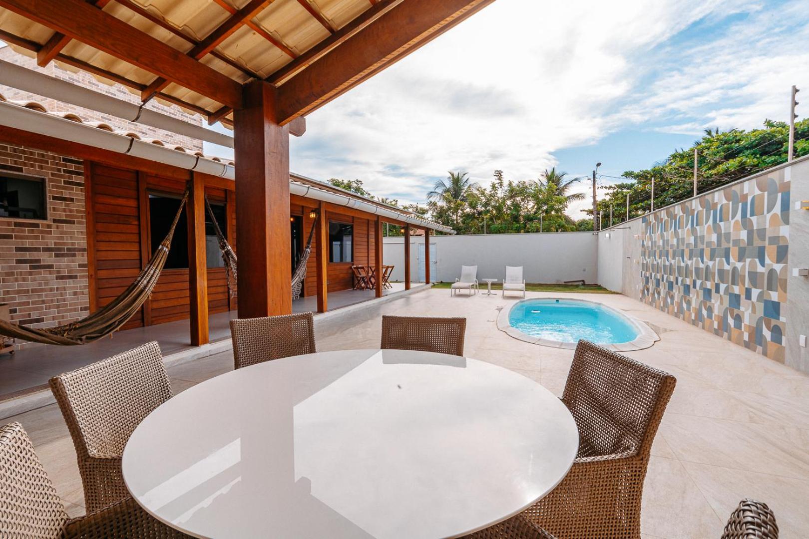 casadecastelhanos, Quadra do MAR de CASTELHANOS, 4 suítes com AR, Churrasqueira, Piscina, Hidromassagem, Cozinha INTEGRADA GOURMET Ideal para FAMÍLIA E AMI