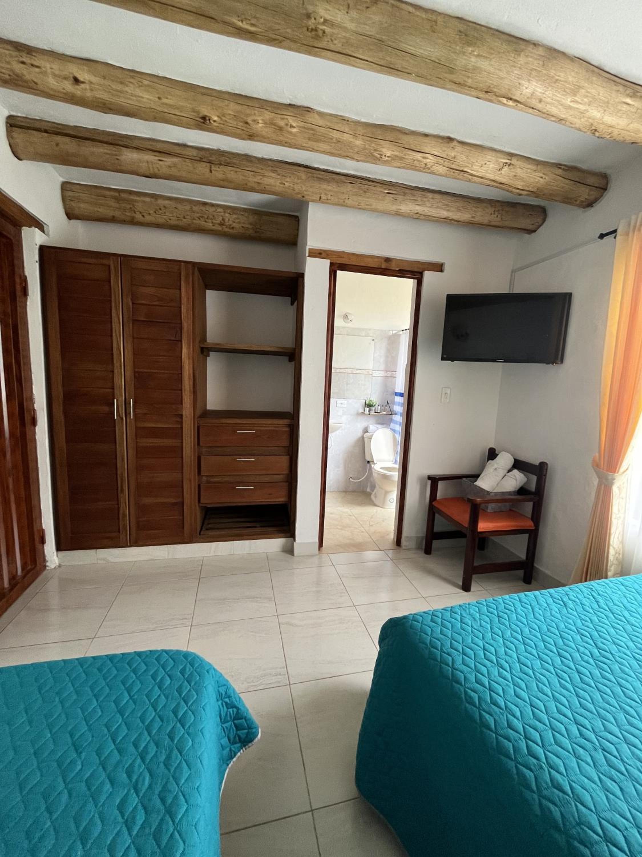 Tres habitaciones en la cabaña Quinta Buenos Aires