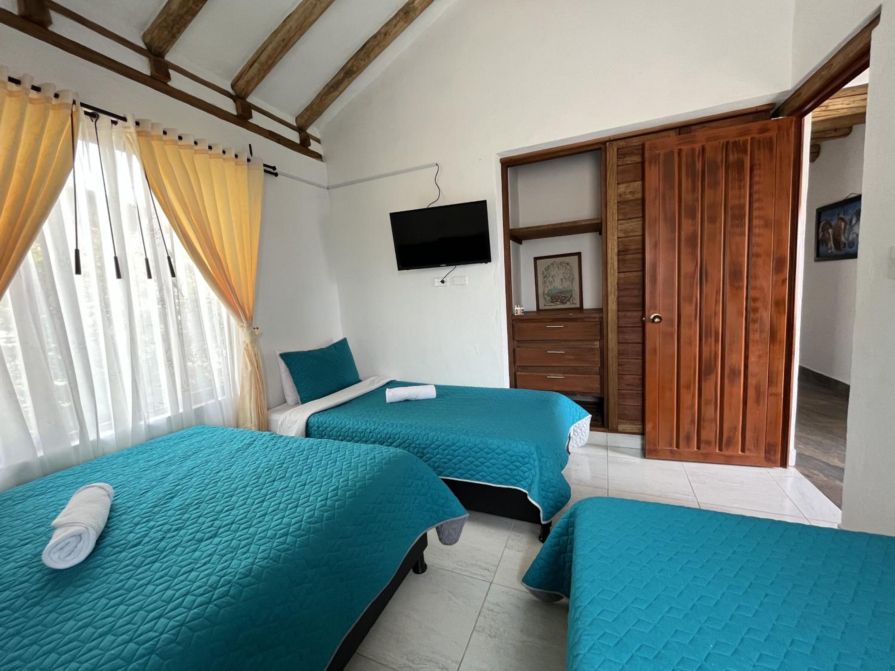 Tres habitaciones en la cabaña Quinta Buenos Aires