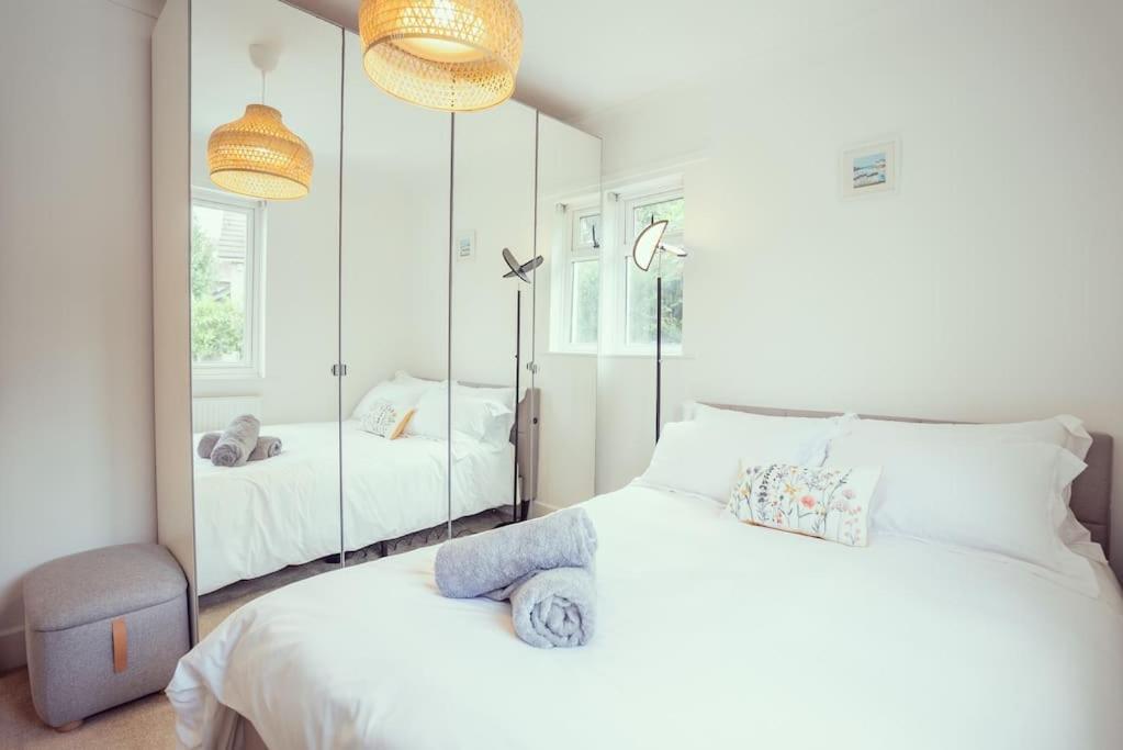 Modern Cottage by sandy beach, in vibrant village; view 5