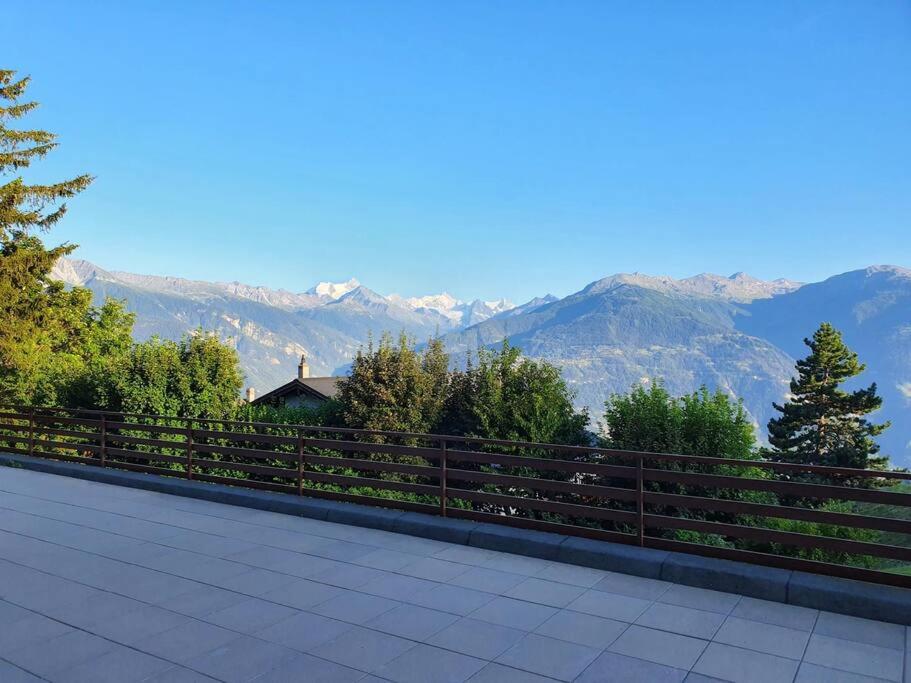 Sunny 2 BR w large terrace, stunning views & pool