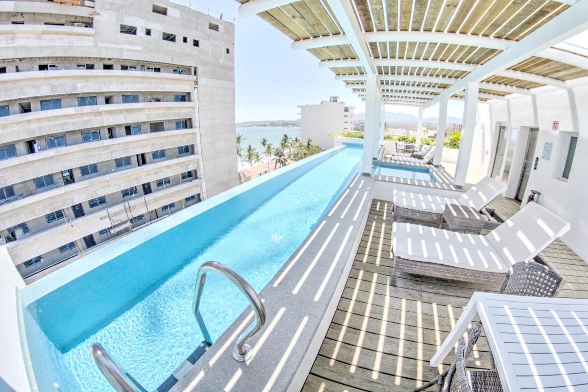 Casa Las Palmas - Condos by the Beach with Rooftop Pool view 4