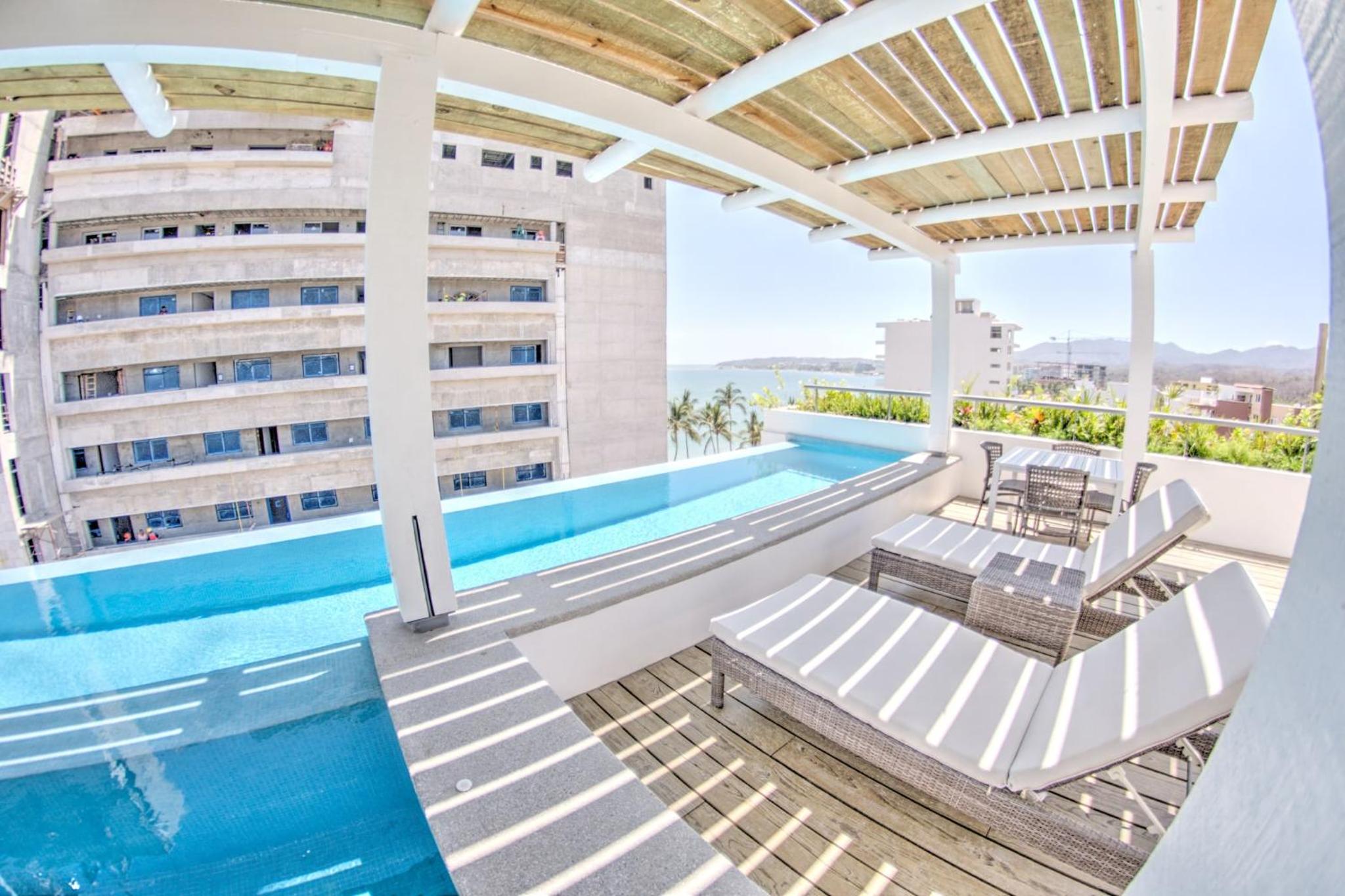 Casa Las Palmas - Condos by the Beach with Rooftop Pool view 5