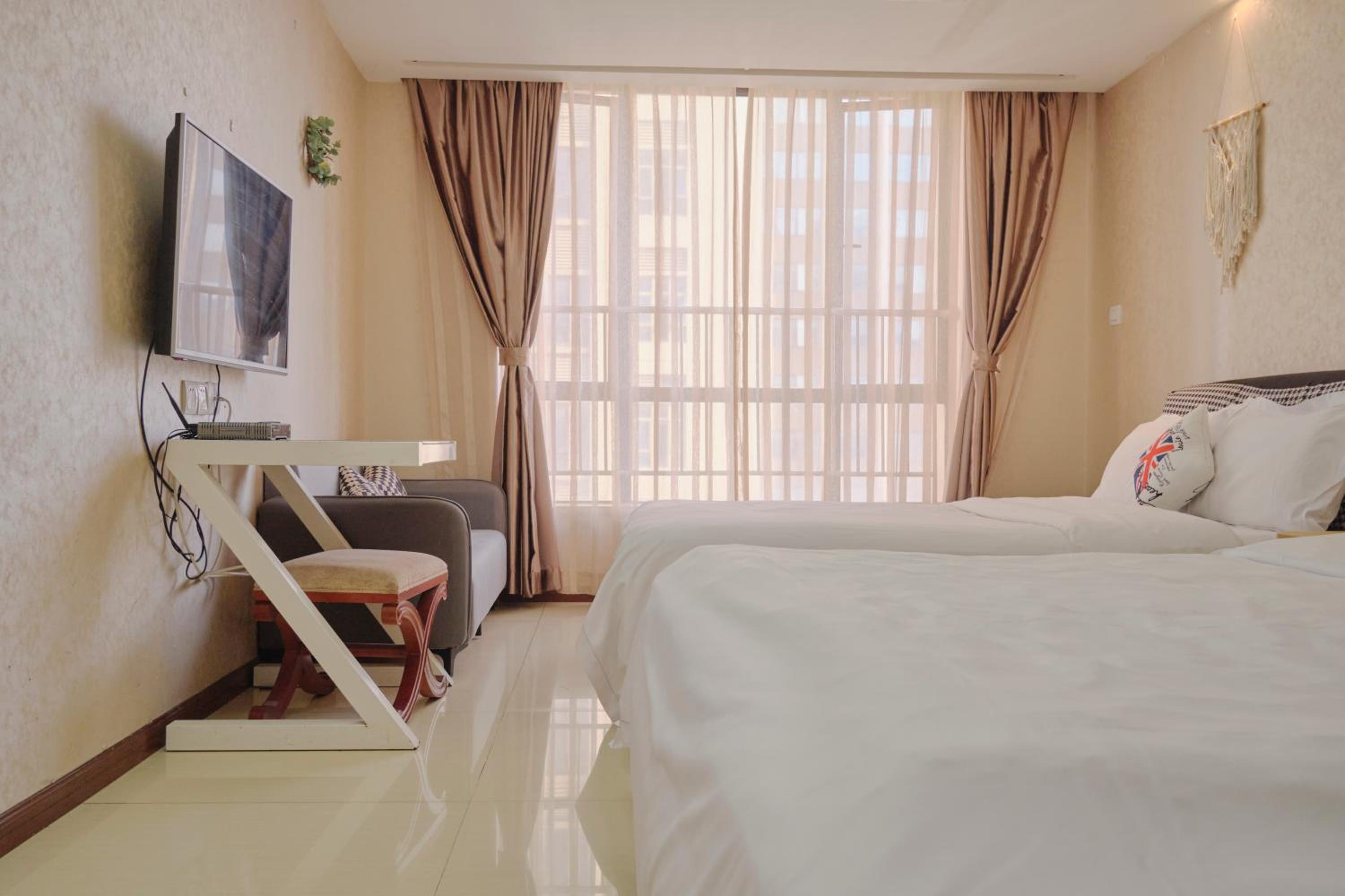 Guangzhou Uhome Service Apartment