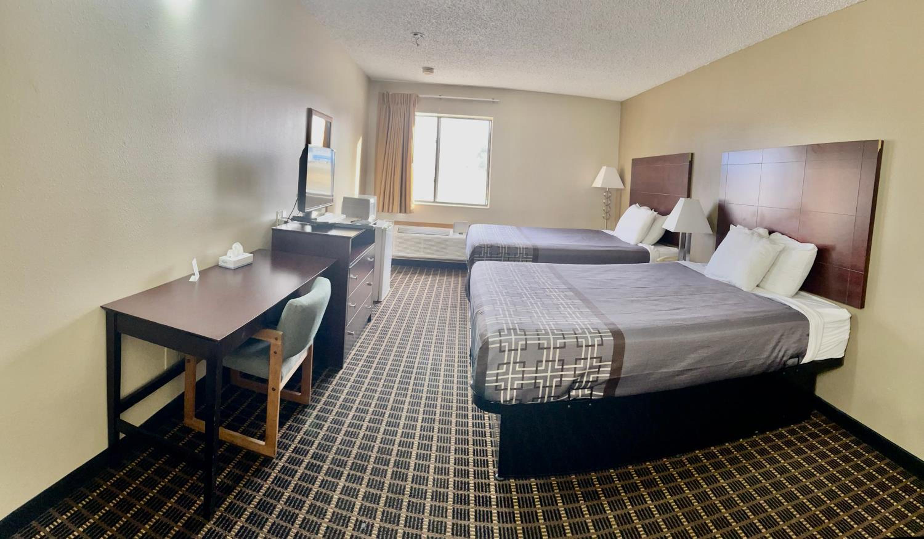 Designer Inn and Suites