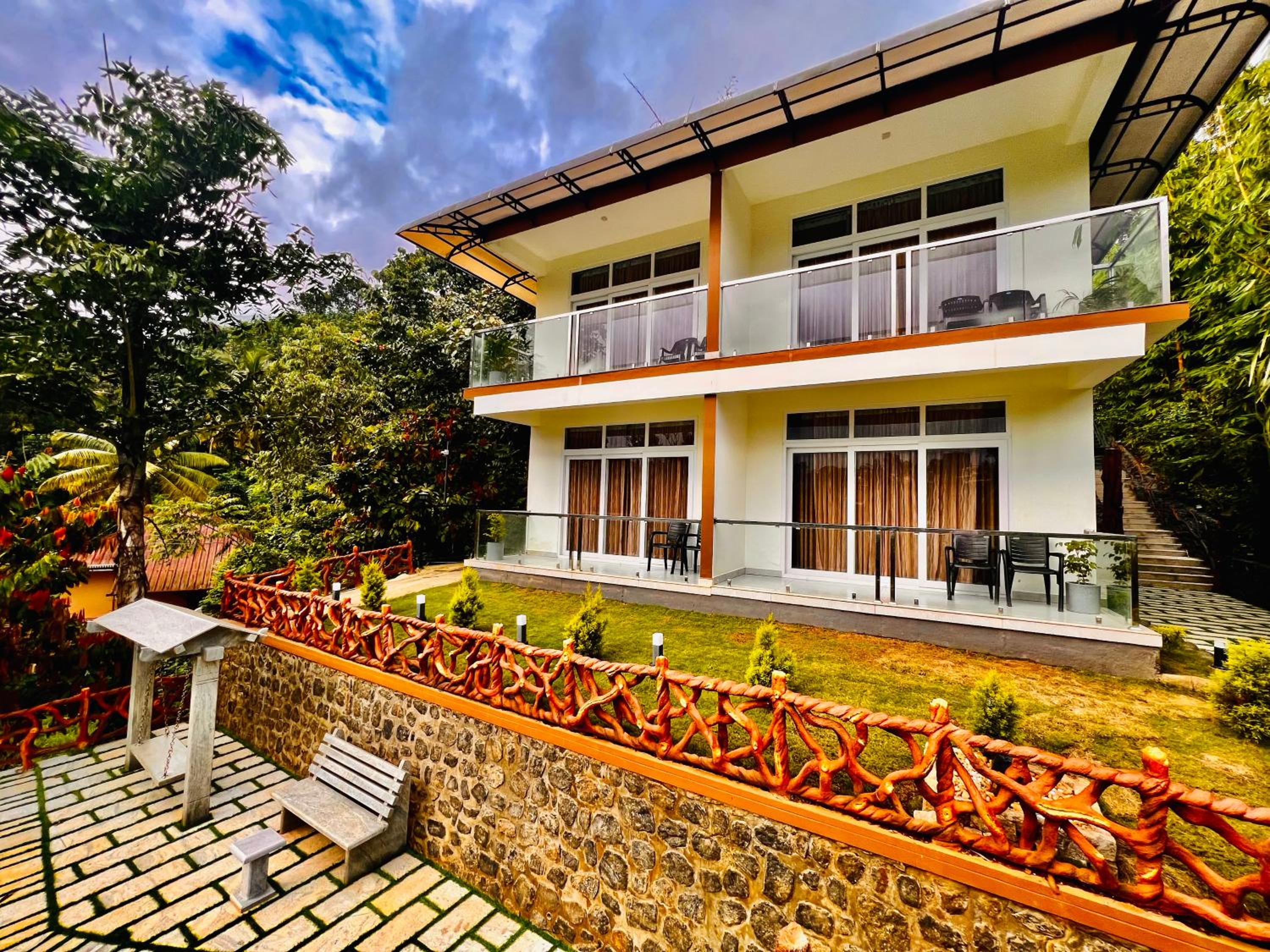 Blue Peaks Holidays Swimming Pool Cottage Munnar view 5
