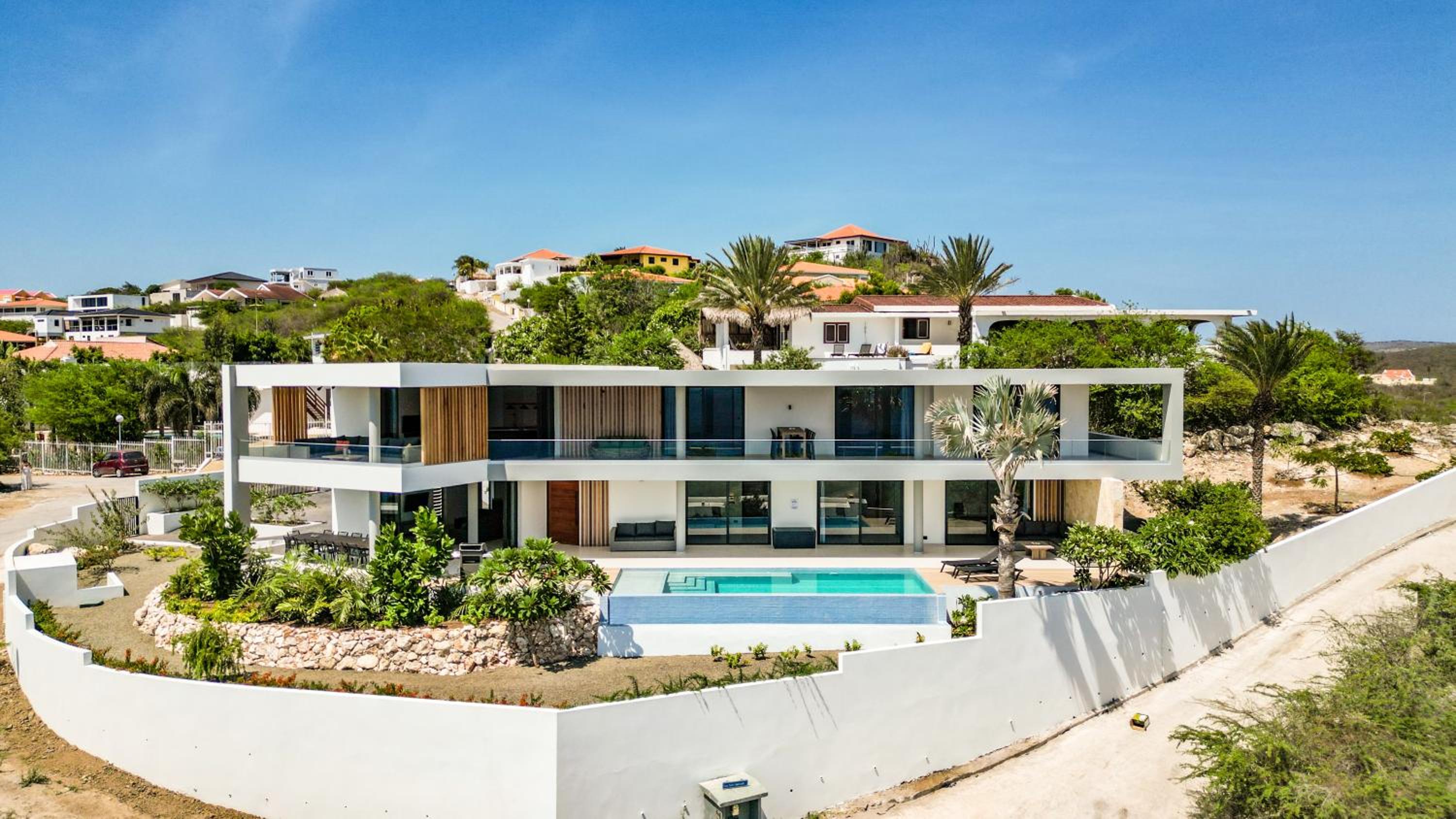 Luxury 12-Guest Villa in Gated Community with Pool, Ocean View & Private Beach Access