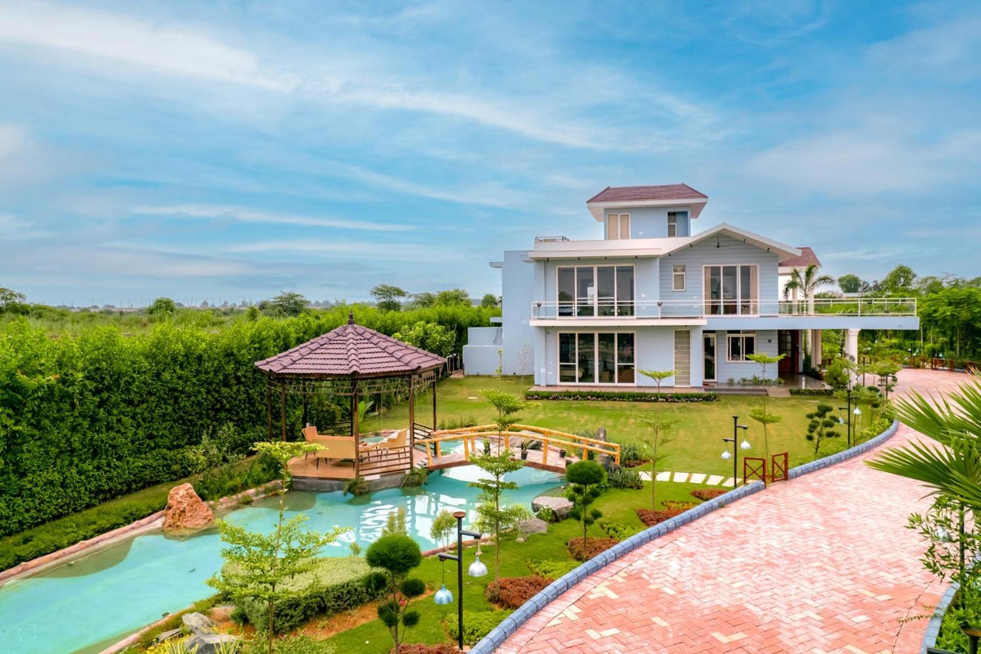 StayVista at Serenity Farms with Pool, Lawn, Bonfire & BBQ view 2