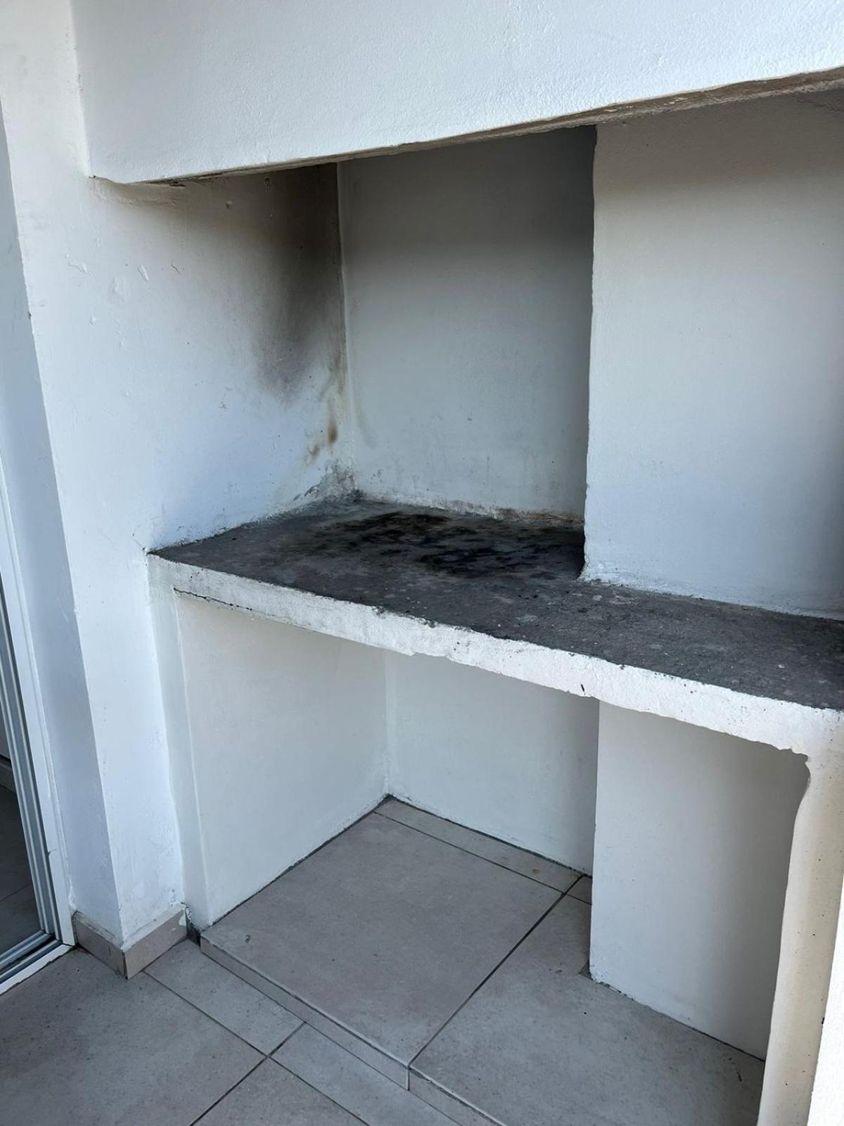 Departamento de dos dormitorios y terraza con asador
