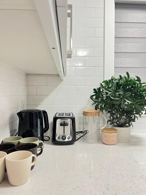 Walking distance to St Boniface, easy parking