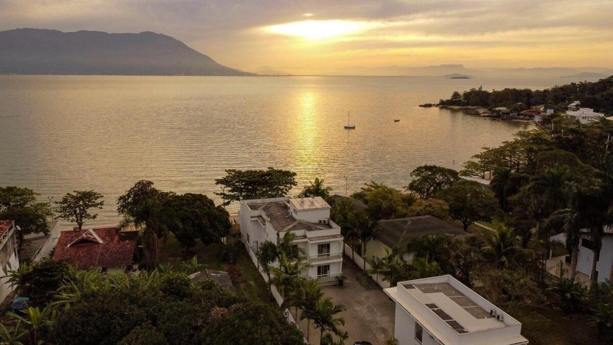 Praia por do sol sossego e exclusividade