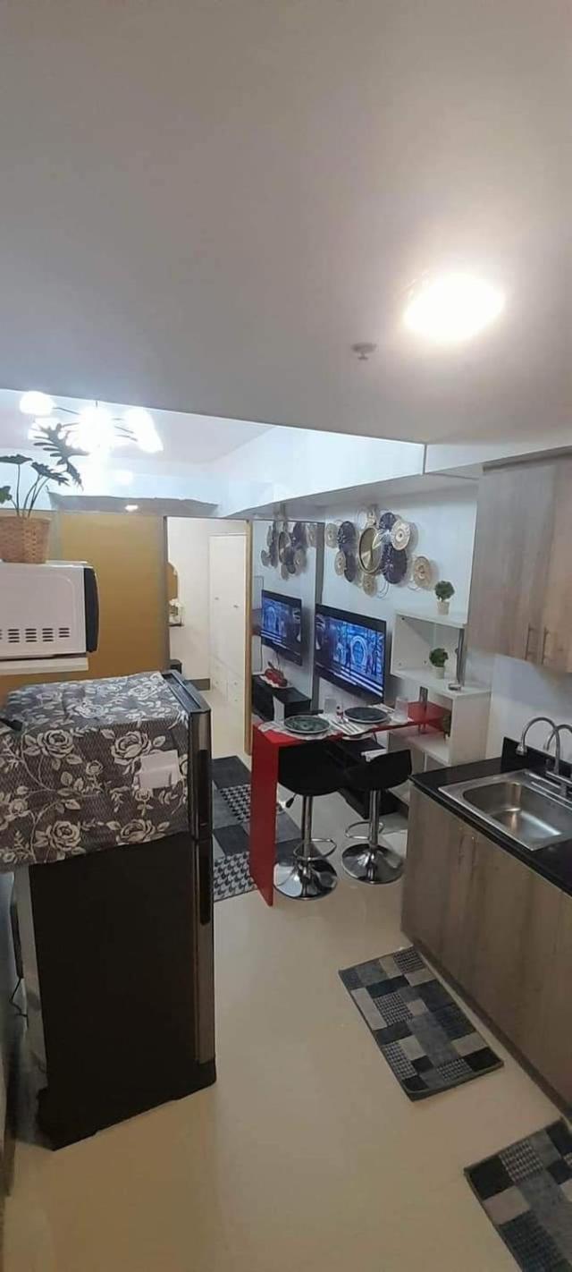 Fame Residences - Comfy 1BR Condo with Free Wi-Fi and Netflix view 5