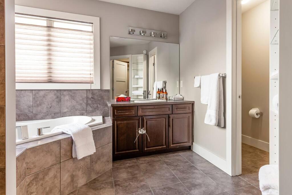 Shop, Dine, and Comfort Family Home Henday Drive Gem