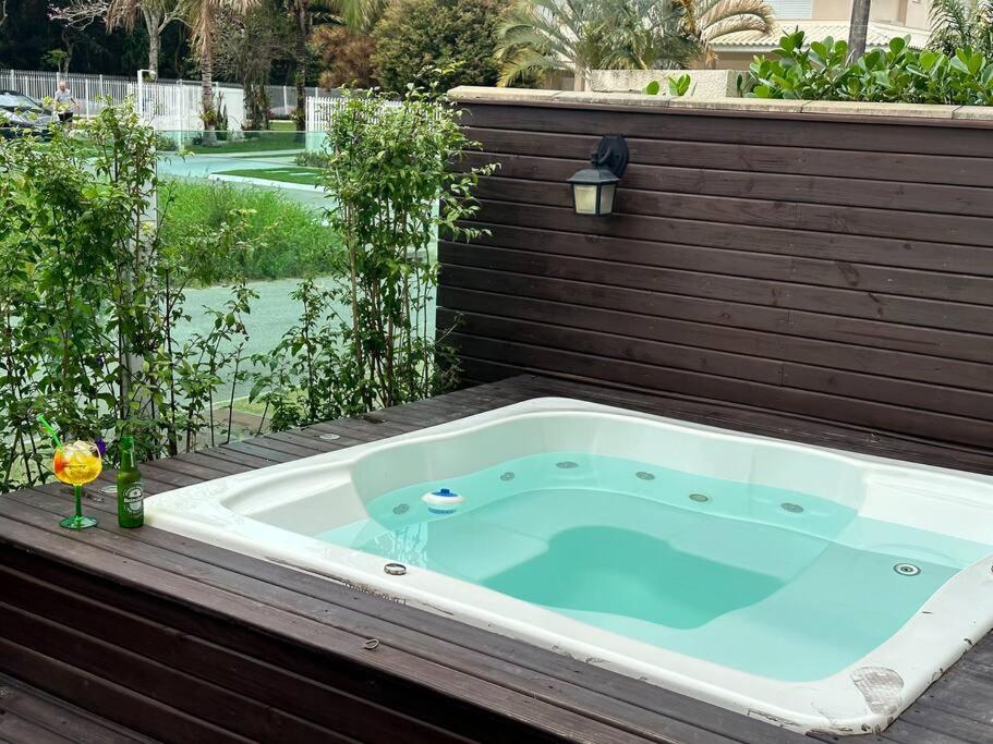 Apto da Felicidade - com jacuzzi e jardim privativo