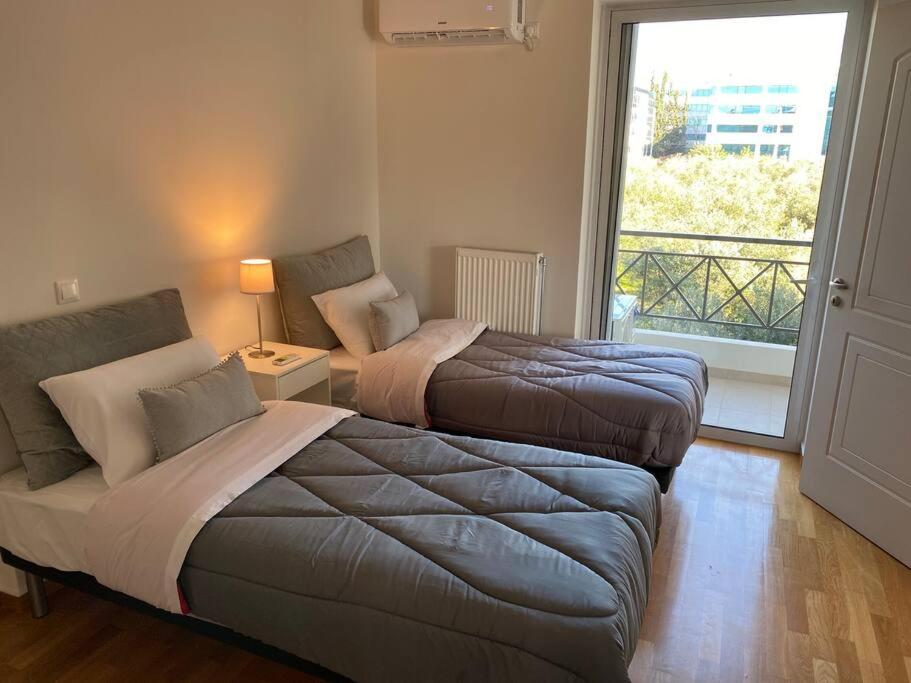 Urban Apartment in Marousi with Rural View