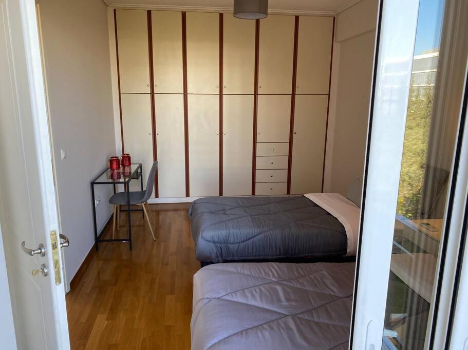 Urban Apartment in Marousi with Rural View