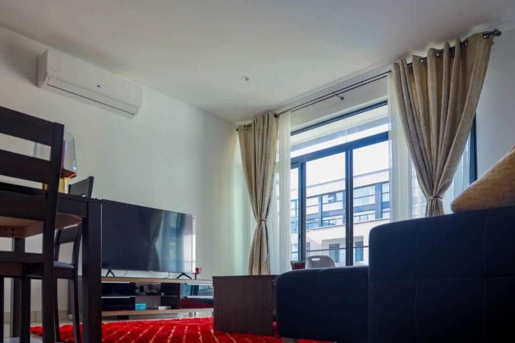 Pool View Apartment @Embassy Gardens view 4