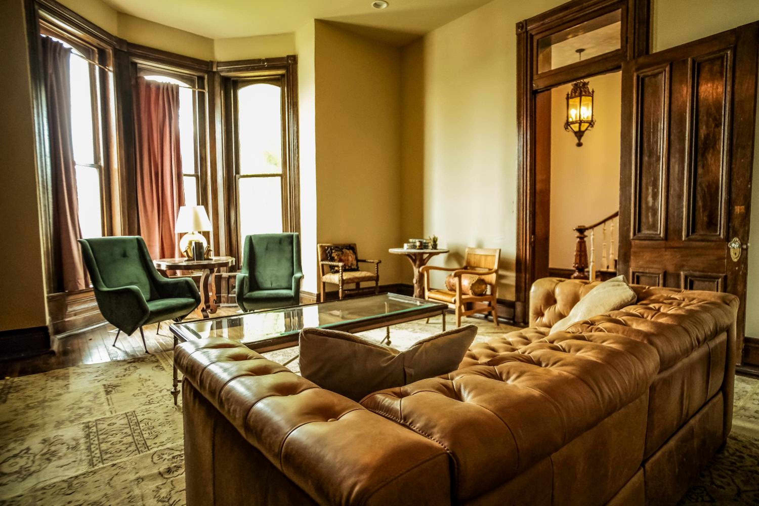 Photograph supplied for Henrie House I Luxury 4BR Downtown Historic Gem with Library & Patio