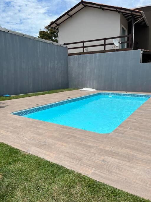 Aconchegante casa de Madeira com linda área lazer!