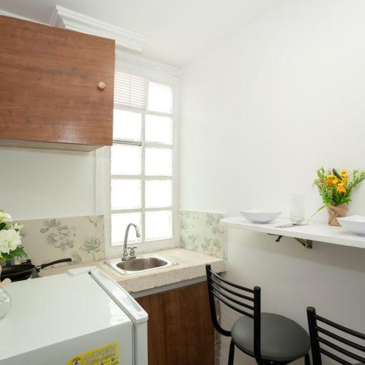 ApartaSuites Bogota MANZINI