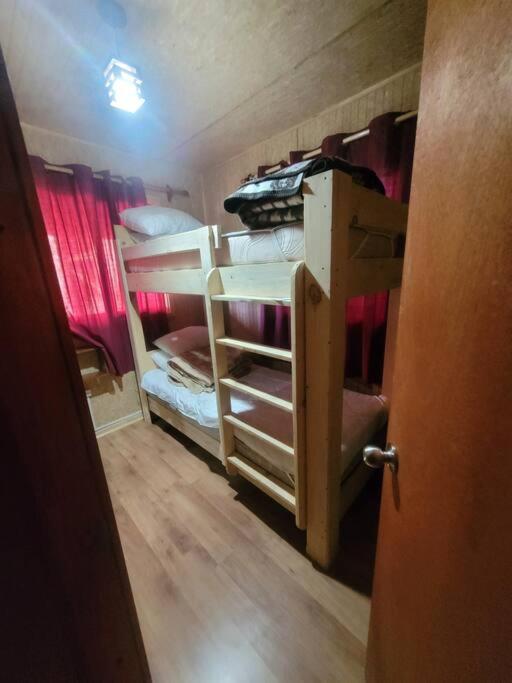 Cabaña con tinaja a orilla del lago Panguipulli