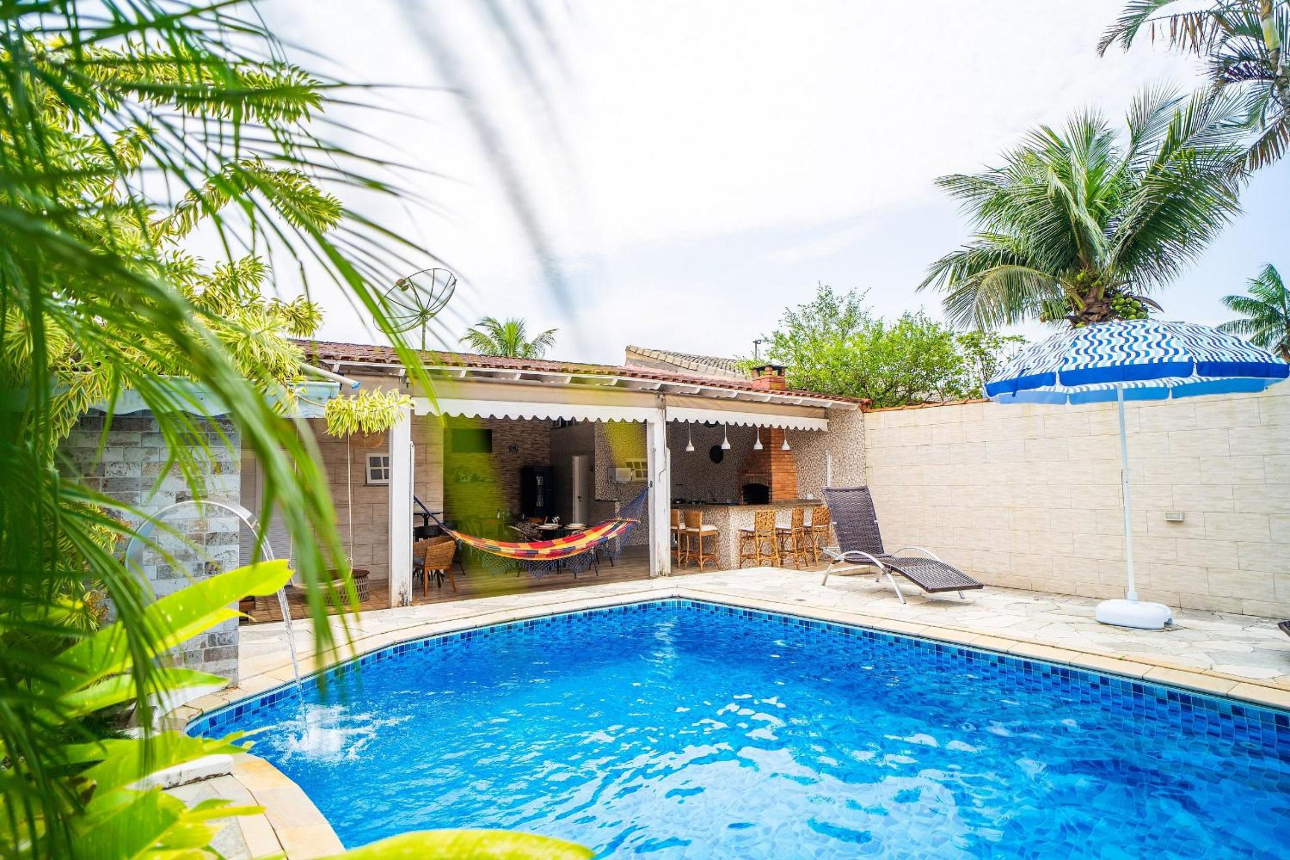 House in gated community with swimming pool