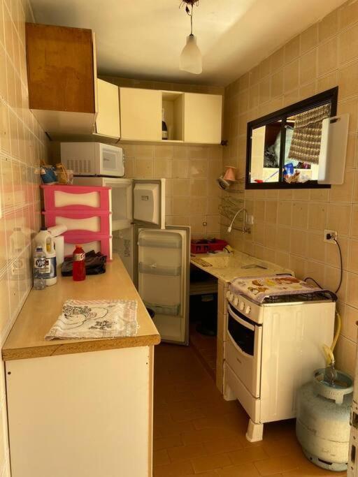 Apartamento Simples Guarujá Enseada Bem localizado